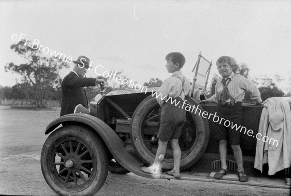 GUS & DICK WITH CAR